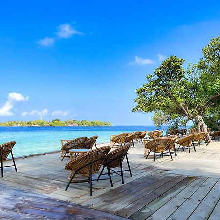 Malahini Kuda Bandos Resort Hulhumale Bagian luar foto View of the island from the resort