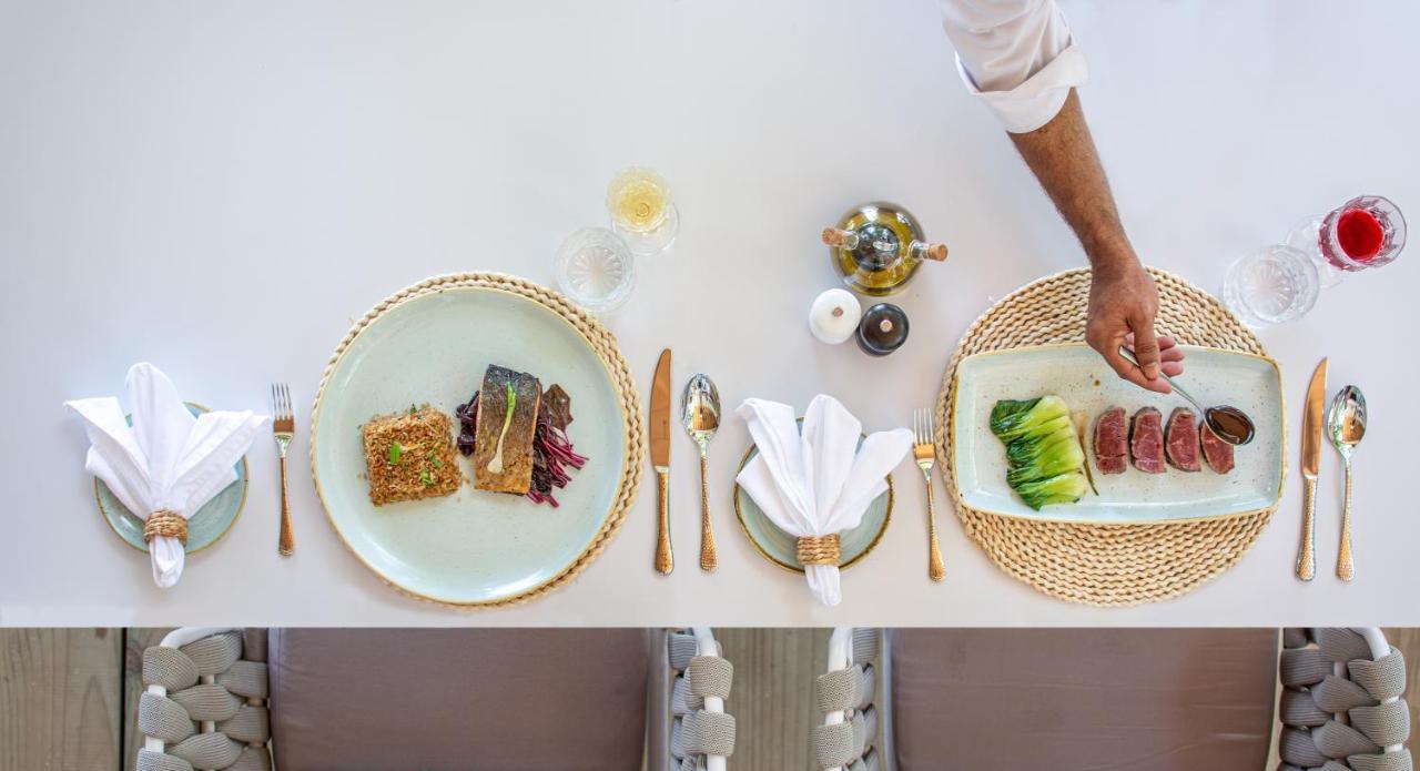 Malahini Kuda Bandos Resort Hulhumale Bagian luar foto A place setting